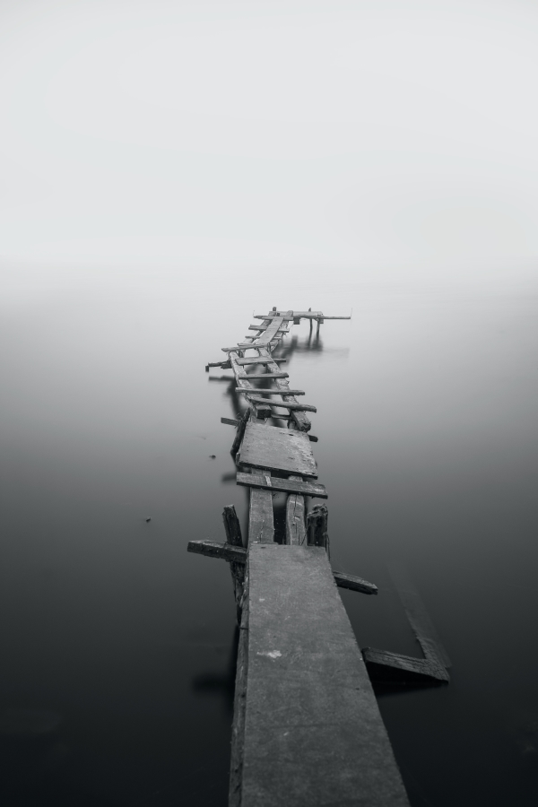 A dissheveled dock in the water